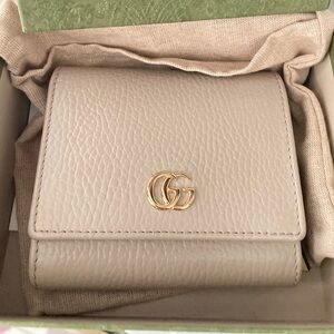 Gucci Cream Pebbled Leather Tri-Fold Wallet with Gold GG